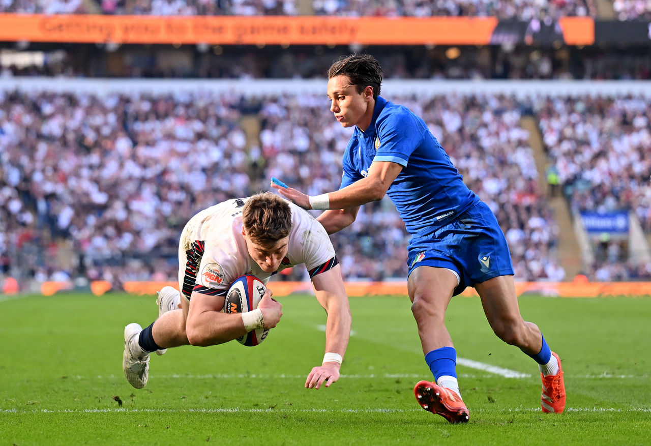 2204165731 LONDON, ENGLAND - MARCH 09: Tommy Freeman of England scores his team's second try as Ange Capuozzo of Italy attempts to tackle during the Guinness Six Nations 2025 match between England and Italy at the Allianz Stadium on March 09, 2025 in London, England. (Photo by Dan Mullan - RFU/The RFU Collection via Getty Images)