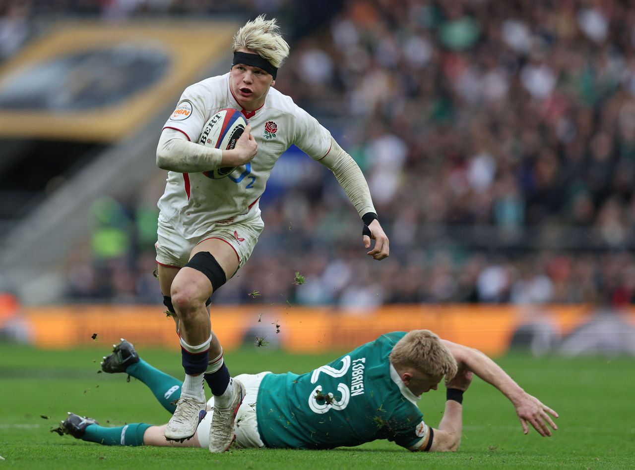 LONDON, ENGLAND - FEBRUARY 21: Henry Pollock of England breaks away from Tommy O'Brien of Ireland during the Guinness Six Nations 2026 match between England and Ireland at Allianz Stadium on February 21, 2026 in London, England. (Photo by Steve Bardens - RFU/The RFU Collection via Getty Images)