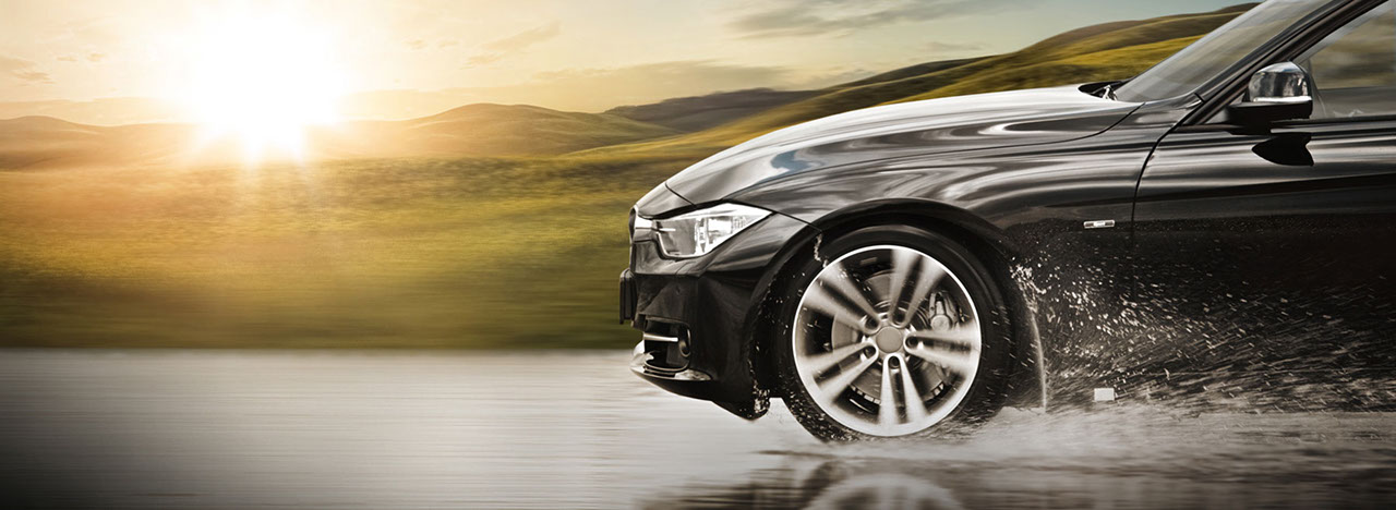Aquaplaning situation with montain background.